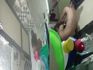 Ahead to this hot teen doll realize naked in hammer away bathtub and spy on her online