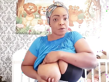 Step-mother Nigerian mom demonstrates off how to milk her thick black bra-stuffers